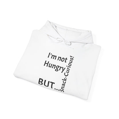 "I'm Not Hungry, But... Snack-Curious!" - Sweatshirt Unissexo Heavy Blend™ com Capuz