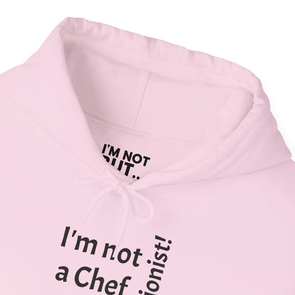 "I'm Not a Chef, But a Nutritionist!" - Sweatshirt Unissexo Heavy Blend™ com Capuz