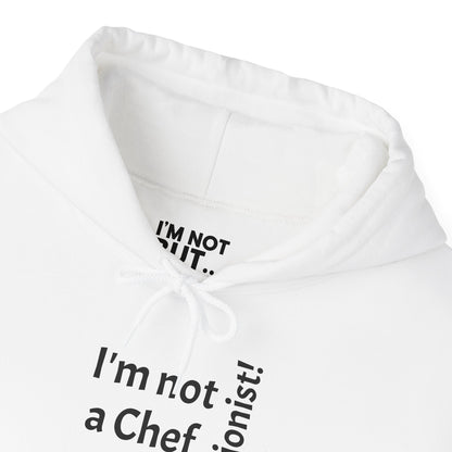 "I'm Not a Chef, But a Nutritionist!" - Sweatshirt Unissexo Heavy Blend™ com Capuz