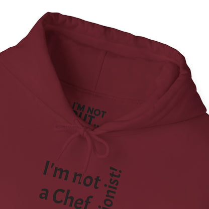 "I'm Not a Chef, But a Nutritionist!" - Sweatshirt Unissexo Heavy Blend™ com Capuz