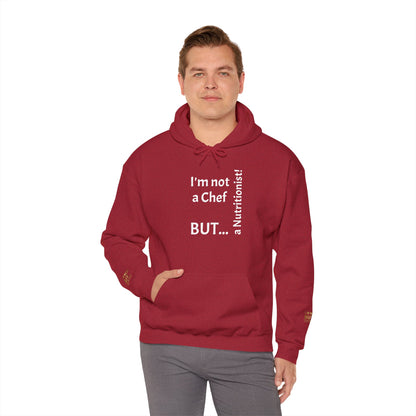 "I'm Not a Chef, But a Nutritionist!"  - Sweatshirt Unissexo Heavy Blend™ com Capuz