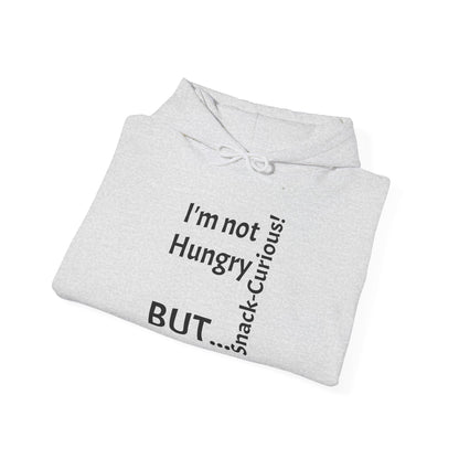 "I'm Not Hungry, But... Snack-Curious!" - Sweatshirt Unissexo Heavy Blend™ com Capuz