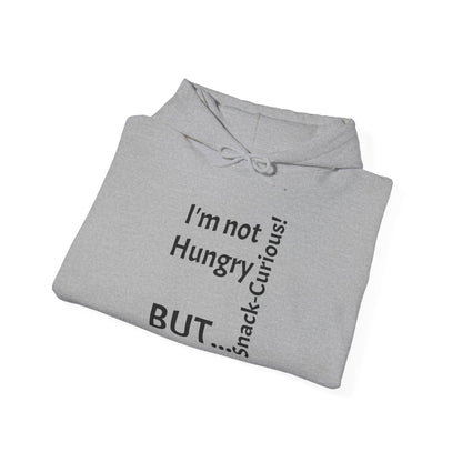 "I'm Not Hungry, But... Snack-Curious!" - Sweatshirt Unissexo Heavy Blend™ com Capuz